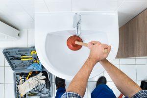 Professional Plumbers Providing Drain Cleaning Services